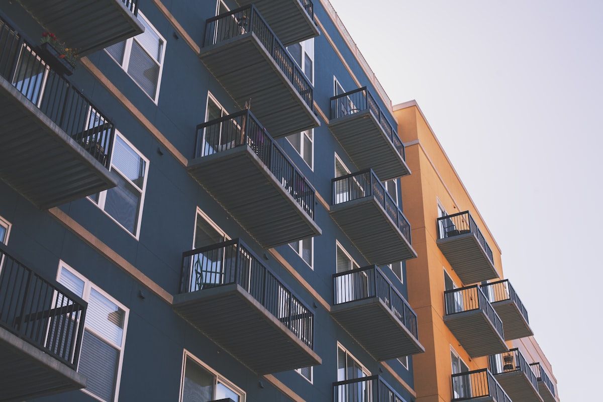 Apartment building facade with rows of balconies
