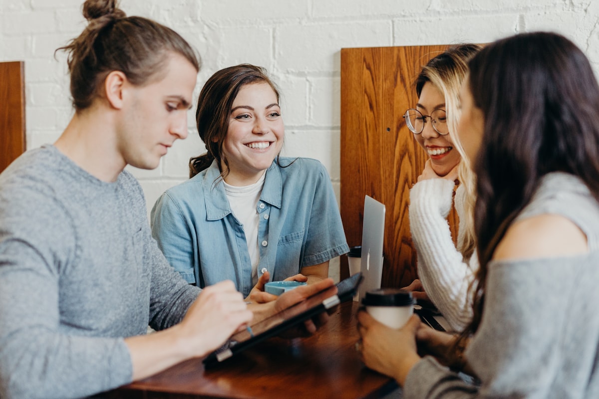 People talking together around a table